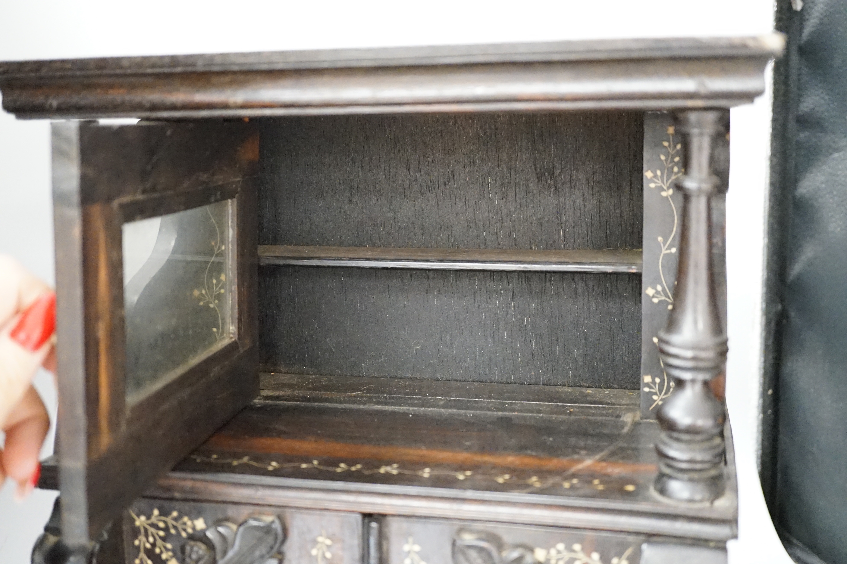 A mid 19th Anglo-Ceylonese ebony and bone inlaid writing box modelled as a parlour cabinet, 29.5cm wide x 40cm high